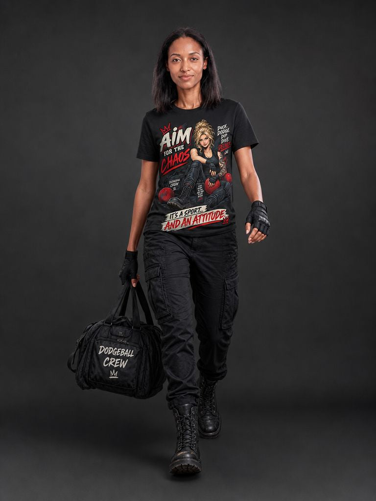 Model wearing a black Aim for Chaos graphic tee with a dodgeball crew bag